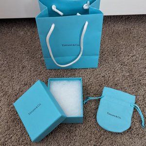 Empty Tiffany & Co. paper bag, box, and drawstring bag